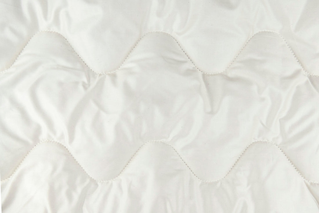white and gray floral textile