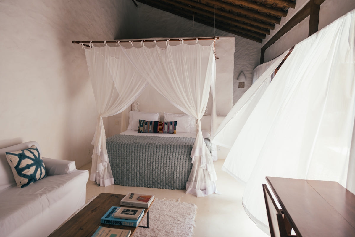 a room with a bed and a table