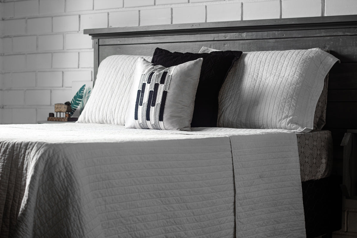 a bed with pillows