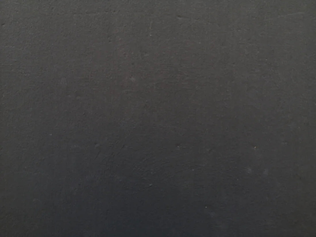 a close up of a cell phone with a black background