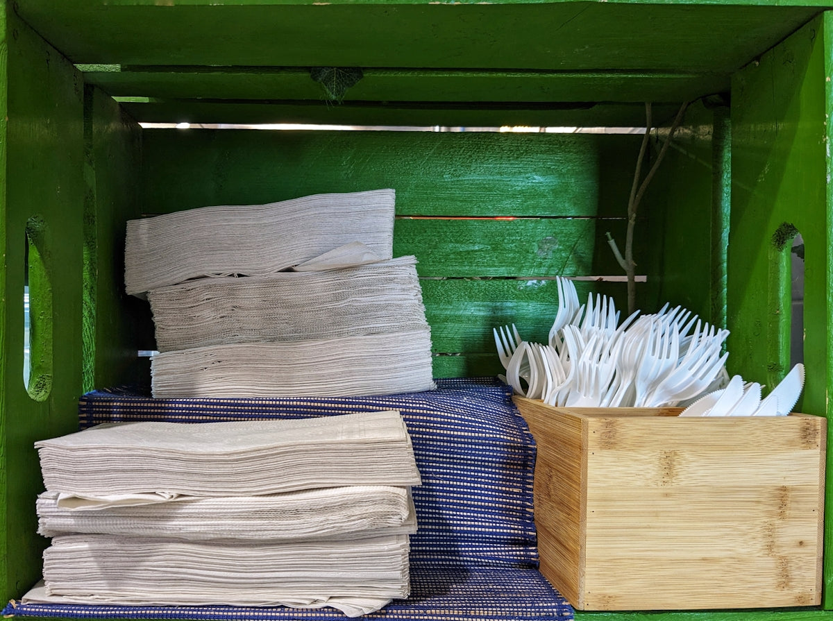 a wooden box filled with lots of papers