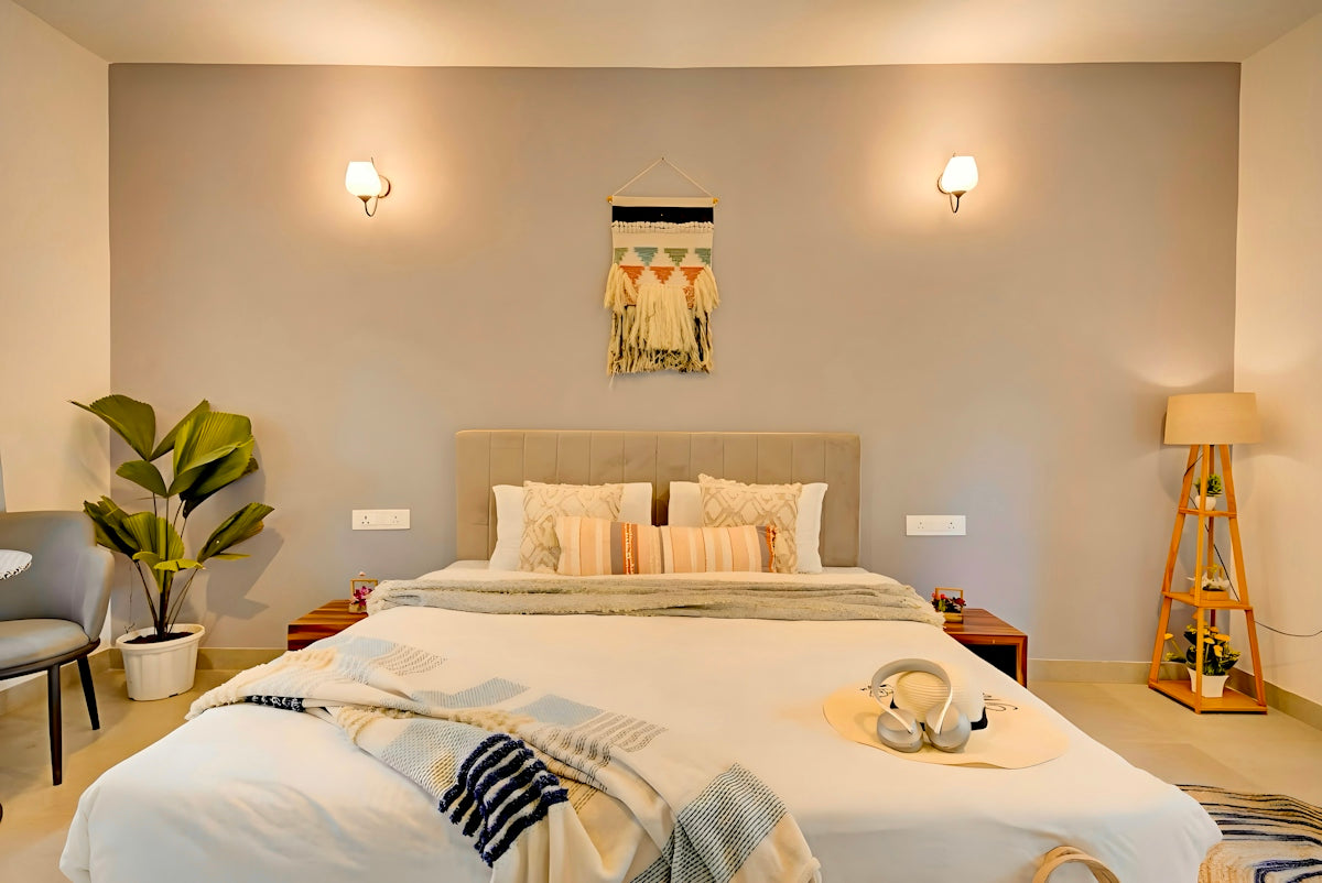 A modern bedroom with a comfortable bed and stylish decor