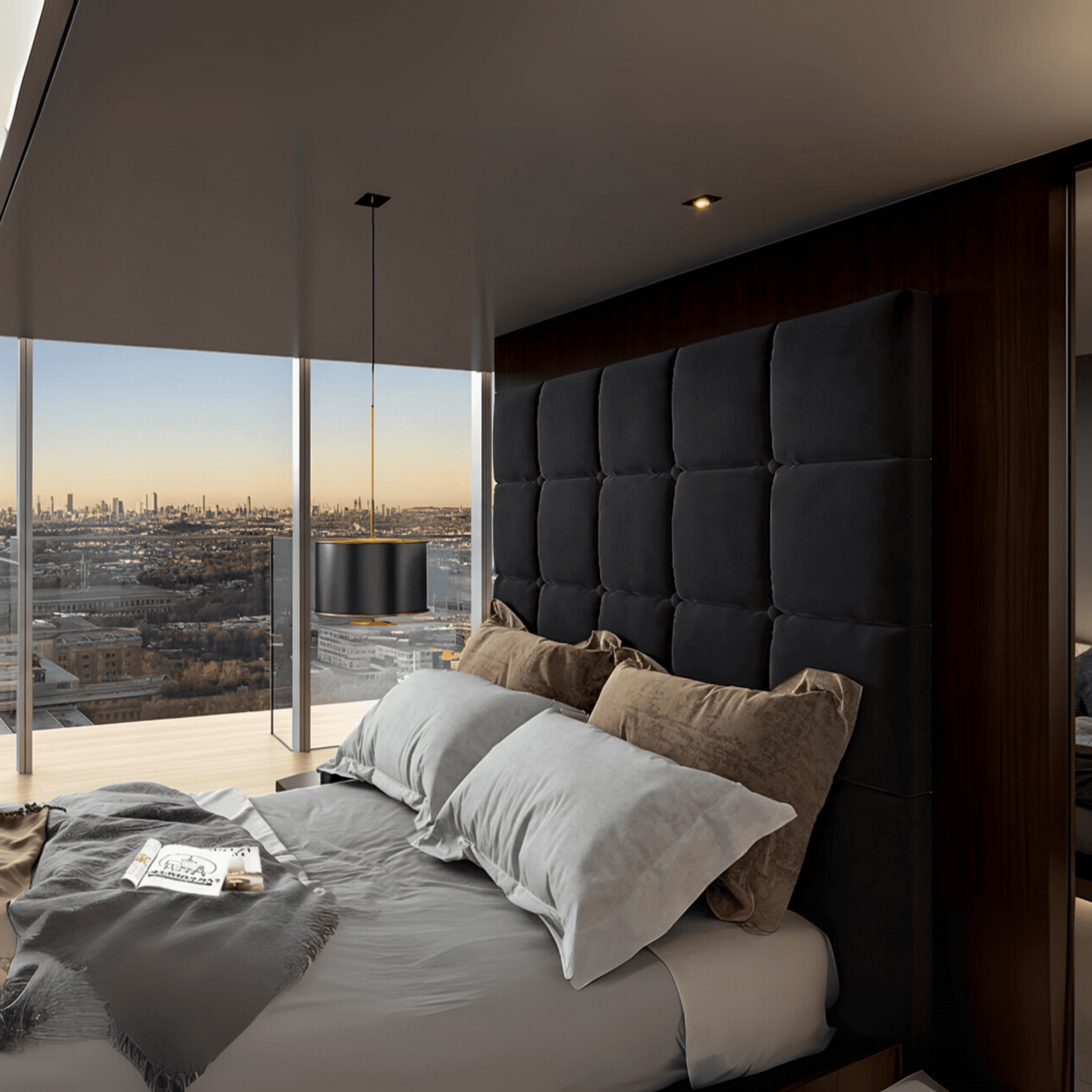 Modern bedroom featuring a upholstered TV bed with cube-stitched headboard and UK Beds Direct logo on the wall