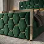 Green velvet headboard with geometric pattern on a bed